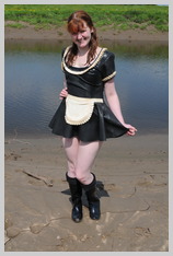 Miss Abigail slops things up in rubber on the mudbanks featuring Miss Abigail, Mistress of Many Kinks Miss Abigail slops things up in rubber on the mudbanks featuring Miss Abigail, Mistress of Many Kinks