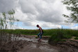 view details of set gm-4m032, Maude takes to the mud in swimsuit over leggings, and trainers